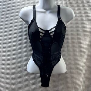Eclectic Treasures ladies  Black Strappy Bodysuit size small (NWT)